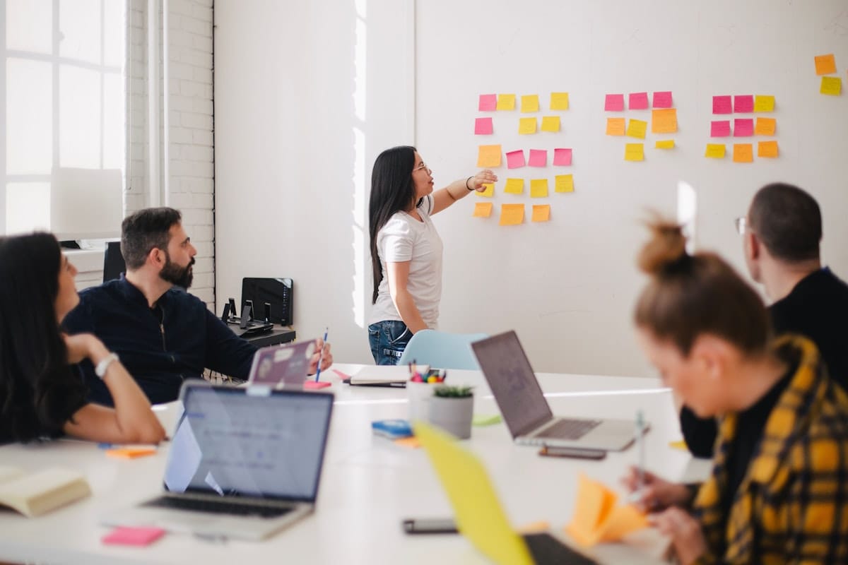 Nonprofit Strategic Planning: A Practical Guide for Small Organizations Team brainstorming with sticky notes on a wall during strategic planning session